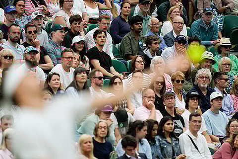 Taylor Fritz of the United States serves to Alexander Zverev